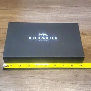 Coach wallet storage box with magnetic closure